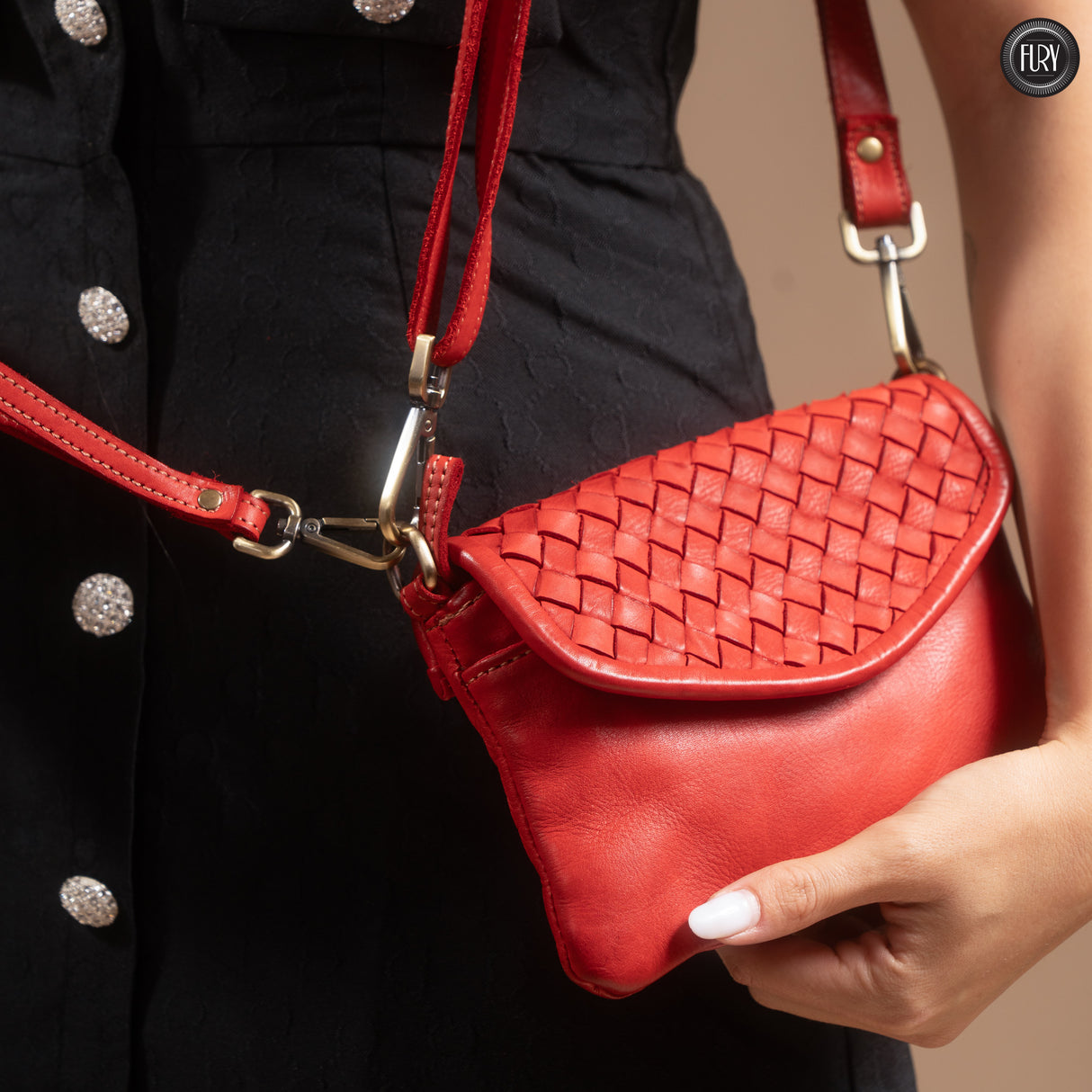 Tecla clutch bag in woven leather