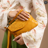 Tecla clutch bag in woven leather