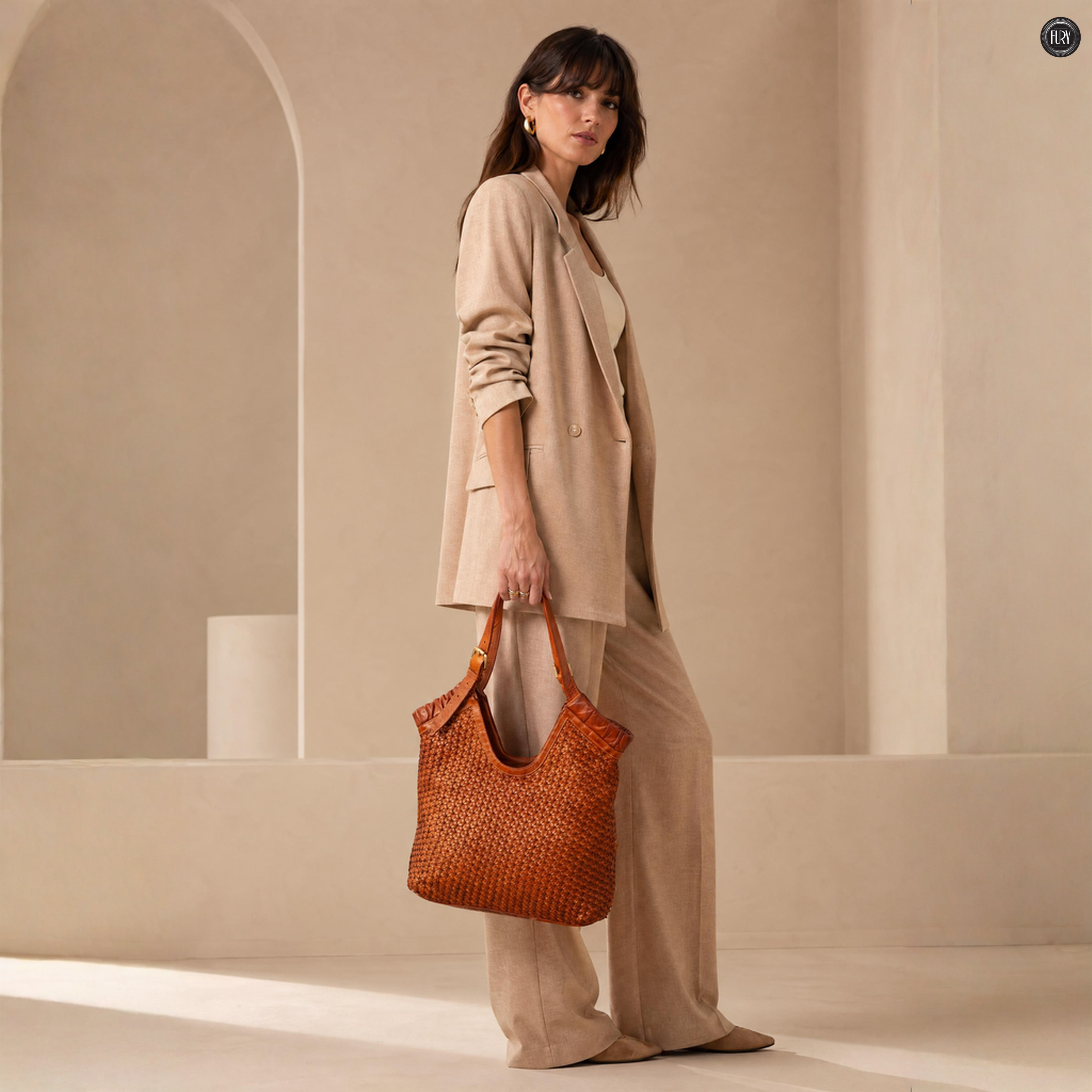 Borsa Anita in pelle intrecciata